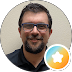 Michael, Google reviewer, smiling with glasses and a short beard